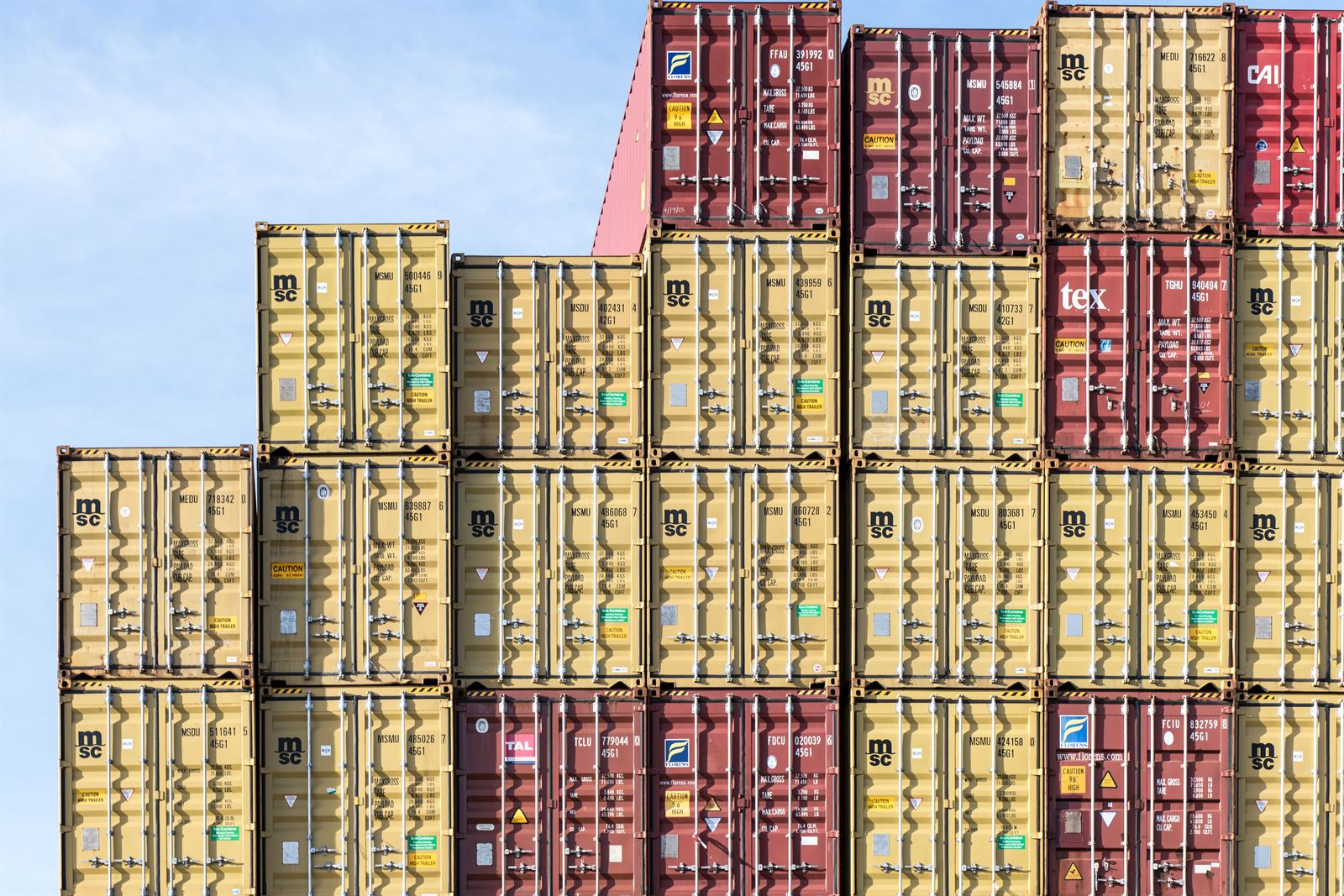 Shipping containers representing import, sourcing, and distribution operations